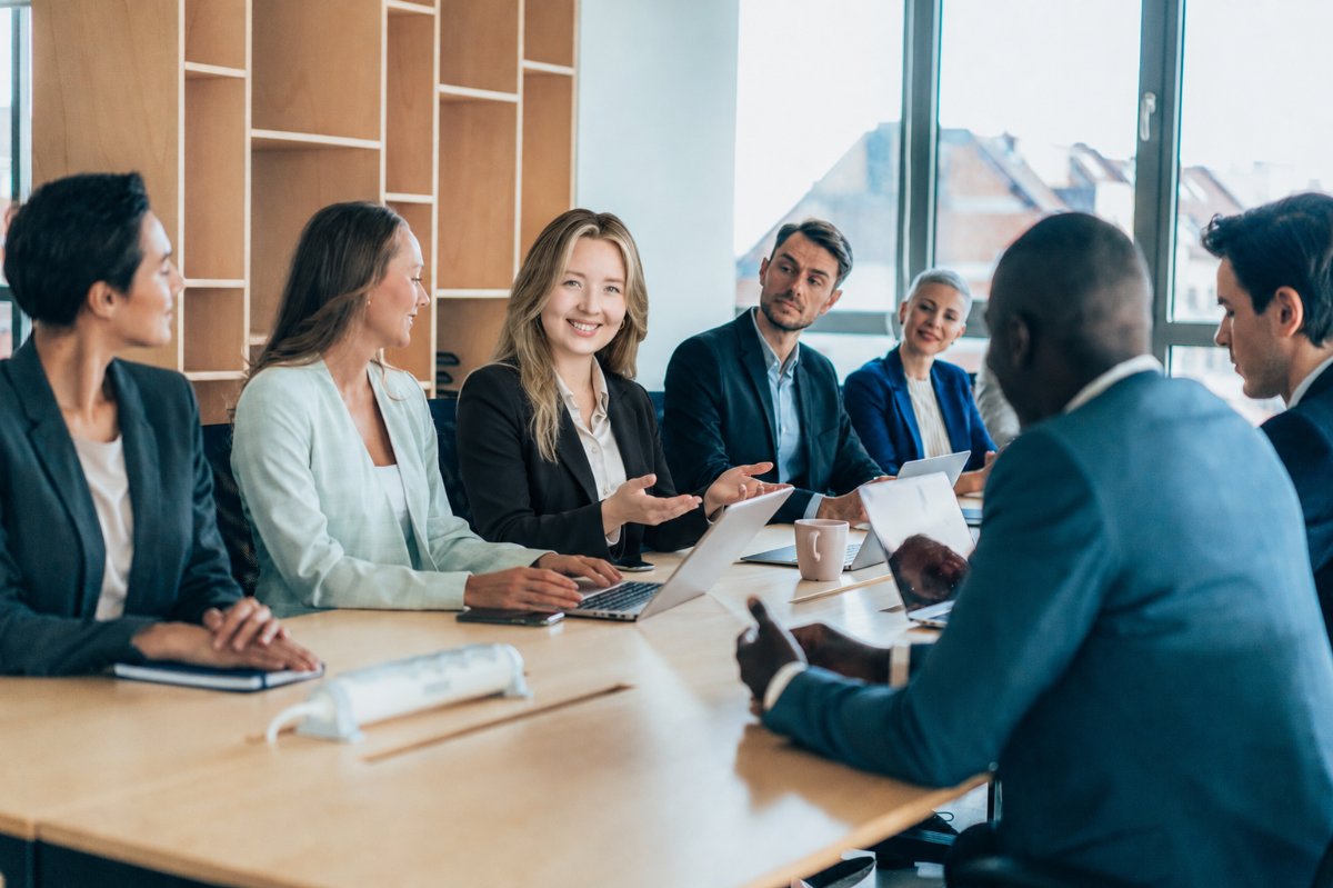 Business owners meeting with a corporate lawyer